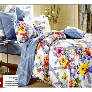 Уютное постельное белье с бантиками и цветами в бело-голубом цвете